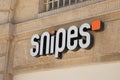 snipes sign logo and text brand front of facade store fashion entrance wall clothes