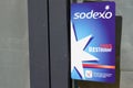 Sodexo brand logo and text sign front of bar door window restaurant entrance Royalty Free Stock Photo