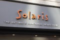 Solaris logo brand and text sign front of store global seller of sunglasses shop