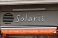 Solaris logo and text sign front of store global seller of sunglasses shop retail