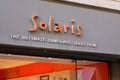 Solaris sign logo and text brand front of facade store fashion clothes boutique