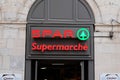 SPAR brand text entrance store supermarket on city street with logo sign for shop