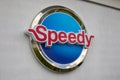 Speedy logo text and brand sign on facade building car repair store station garage