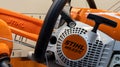 Stihl dealership German manufacturer logo brand and text sign on electric chainsaw