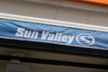 SUN VALLEY logo and text sign of French store skiing skiwear and sports chic shop