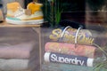 Superdry logo sign and text brand of london British fashion store clothing boutique
