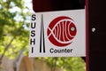 sushi counter text brand and logo sign on wall asian restaurant wall facade japanese