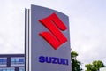 Suzuki logo of car motorbike store dealership sign of japan brand