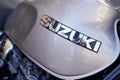 Bordeaux , Aquitaine / France - 07 25 2020 : suzuki motorcycle vintage grey tank with large text logo sign on old motorbike Royalty Free Stock Photo