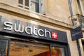 Swatch logo brand and text sign store swiss fun watch manufacturing watches shop