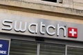 Swatch logo and text sign store swiss fun watch manufacturing watches shop