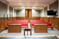 Table and chair in the courtroom in the court of justice with the desk of the Royalty Free Stock Photo