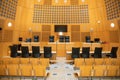 Table and chair in modern courtroom in the court of justice with the desk of the