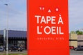 Tape a l`oeil logo and text sign of French clothing brand for children and babies