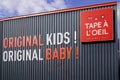 Tape a l`oeil logo and text sign original kids and baby signage in store street