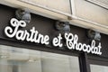 Tartine et Chocolat sign logo and text front of store birth clothes toddlers brand
