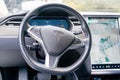 Bordeaux , Aquitaine / France - 11 30 2019 : Tesla Car logo on Wheel black interior electric vehicle with tablet screen