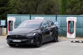 Tesla model X charging point Supercharger car station fast charged for american Royalty Free Stock Photo