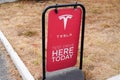 Tesla panel information for test drive car ve electric logo sign front of Dealership