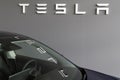 Bordeaux , Aquitaine / France - 11 13 2019 : Tesla store logo sign dealership reflection in model 3