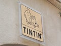 Tintin logo text and brand sign store of comic hero shop of herge book comics boutique