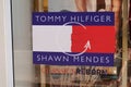 Tommy Hilfiger shawn mendes classics reborn logo brand and text sign on facade windows Royalty Free Stock Photo