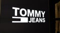 Tommy jeans Hilfiger text brand and logo store premium American clothing company sign Royalty Free Stock Photo