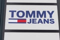 Tommy jeans Hilfiger text sign and logo store front of American clothing company shop Royalty Free Stock Photo