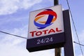 Total 24/24 brand petrol fuel company text and logo sign on gas service station shop Royalty Free Stock Photo