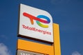 Total energies brand text company logo sign car Totalenergies service station