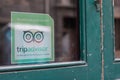 Tripadvisor certificate logo label and sign text on windows store or restaurant in