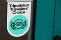 Tripadvisor travellers choice logo brand and sign text on shop facade windows store Royalty Free Stock Photo