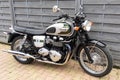 Triumph bike bonneville t100 detail sign text and brand logo on motorcycle 110th