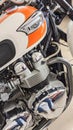 Triumph bonneville motorcycle detail sign text and logo on orange white fuel tank on