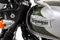Triumph bonneville t100 motorcycle detail sign text and brand logo on retro silver Royalty Free Stock Photo