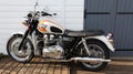 Triumph bonneville t100 motorcycle in vintage style retro parked outdoors