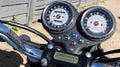 Triumph logo sign on speedometer dashboard bonneville t100 motorcycle 50th anniversary