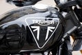Triumph scrambler 900 motorcycle detail sign text and brand logo on retro fuel tank on