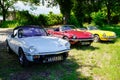 Bordeaux , Aquitaine / France - 06 01 2020 : Triumph Spitfire vintage car model three cars parked in green grass with white red Royalty Free Stock Photo