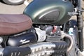 Triumph vintage scrambler 900 motorcycle detail fuel tank on motorbike classic Royalty Free Stock Photo