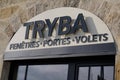 Tryba text sign on store chain brand logo shop specialized in door windows shutters in