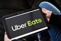 Bordeaux , Aquitaine / France - 12 04 2019 : Uber Eats sign logo tablet home application UberEats food delivery app