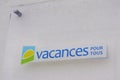 Vacances pour tous text sign and facade logo homes and apartments brand holiday for