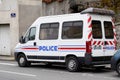 Van car with logo sign text of police french parked in city street based on vehicle