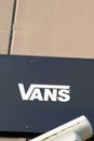 Vans logo and text sign front of fashion store of american footwear shoes apparel Royalty Free Stock Photo