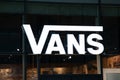 vans sign text and logo brand on facade store wall entrance shop signage fashion Royalty Free Stock Photo