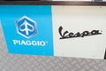 Vespa piaggio logo brand and text sign store scooter italian shop motorcycle panel