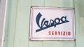 vespa servizio old logo brand and ancient text sign on panel service piaggio scooter