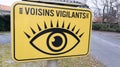 Voisins vigilants french sign logo Neighbourhood Watch area yellow eye sign to