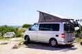 Volkswagen Camper Van Bulli westfalia open roof up parked in camping area